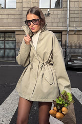 Manteau ample et polyvalent à ceinture cintrée