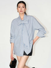 Blouse oversize en coton à rayures et nœud papillon