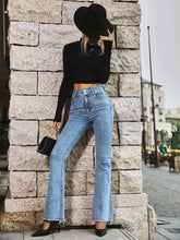Pantalon en jean décontracté à bords effilochés
