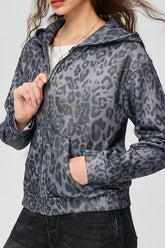 Sweat à capuche zippé en maille dos nu uni