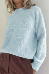 Pull à manches longues et col rond en maille torsadée unie