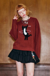 Pull en maille avec chat dansant