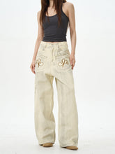 Pantalon large crème brodé