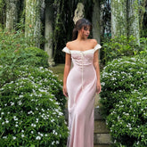 Robe mi-longue à manches bouffantes et taille cintrée