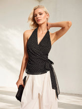 Débardeur sans manches à pois, col halter et taille nouée