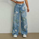 Pantalon en jean délavé à imprimé floral