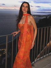 Robe longue bustier à empiècements en résille