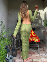 Robe longue dos nu à décolleté plongeant et fente en V ornée d'un ruban