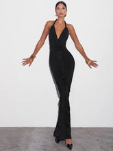 Robe longue noire froncée à décolleté en V profond