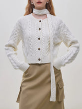 Gilet court en maille à fleurs torsadées