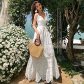 Robe bohème sans manches à décolleté en V profond et dentelle ajourée