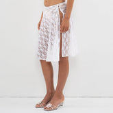 Jupe midi bohème fleurie en résille transparente