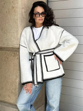 Manteau en maille patchwork à lacets