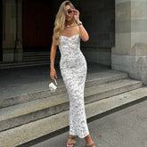 Robe à bretelles en dentelle transparente à motif floral