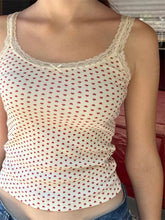Haut en maille dentelle papillon