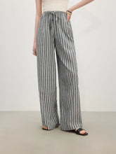 Pantalon rayé taille haute drapé
