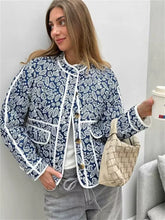 Manteau à poches contrastées imprimées