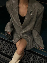 Manteau à revers à poches pailletées
