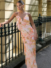 Robe de vacances dos nu à volants et imprimé licou