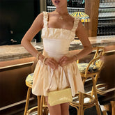 Mini-robe froncée à bretelles et épissure