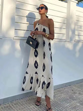 Robe midi asymétrique imprimée dos nu