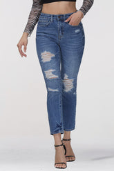 Jean skinny bleu déchiré taille haute longueur cheville