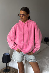 Sweat à capuche en coton uni délavé et vieilli