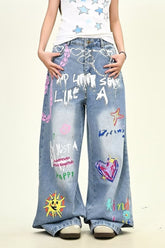 Jean oversize délavé à jambes droites brodé d'étoiles