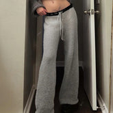 Pantalon évasé en maille à motif étoiles