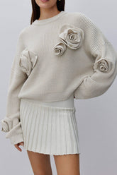 Pull en maille à manches longues à motif rose