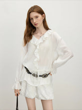 Blouse botanique élégante à manches à volants