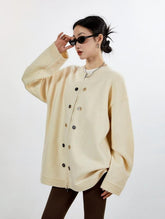 Cardigan en maille à bordure côtelée, oversize, bouton et fermeture éclair
