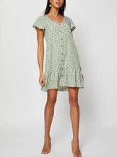 Robe imprimée à col en V et simple boutonnage