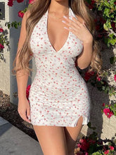 Robe imprimée à col V dos nu et coupe ajustée portefeuille