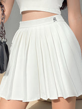 Jupe plissée taille haute et moulante