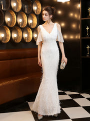 Robe de soirée élégante à franges et perles 