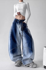 Jean vintage taille haute, jambes larges, délavage dégradé et coupe cintrée