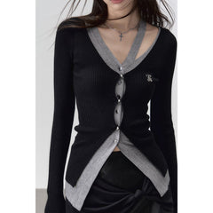 Gilet long élégant en maille noire avec découpes ajourées