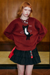 Pull en maille avec chat dansant