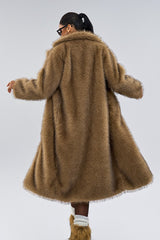 Manteau long chaud et tendance en fausse fourrure à col large