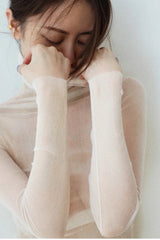 Sous-couche à col roulé en tulle de soie et dentelle transparente