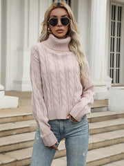 Pull rose à col montant 