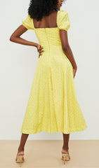 Robe midi vintage à manches bouffantes et imprimé floral jaune 