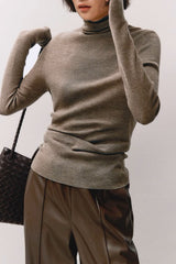 Sous-vêtement technique ajusté à col montant en laine douce