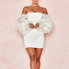 Robe de cocktail bustier à manches longues 