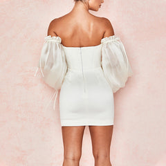 Robe de cocktail bustier à manches longues 