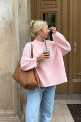 Pull rose à col rond et coupe ample