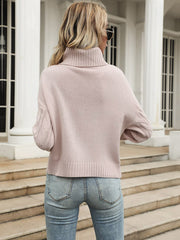Pull rose à col montant 