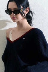 Gilet en maille bleu marine à col V