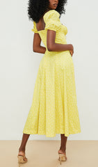 Robe midi vintage à manches bouffantes et imprimé floral jaune 